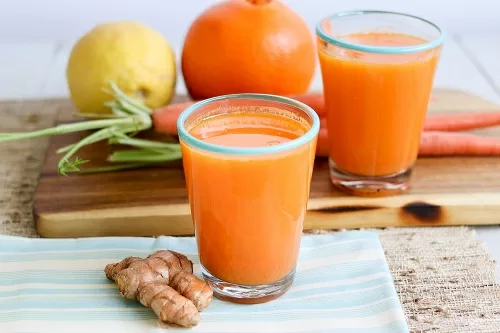 Tác dụng của nước ép nghệ tươi trong sức khỏe con người